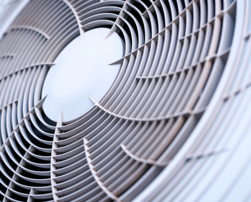 Geometric Pattern Created By The Circular Gray Plastic Ventilation Grille